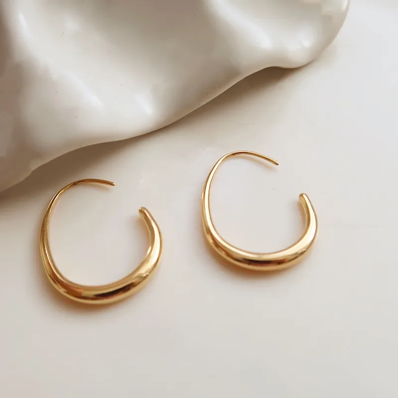 Sunlit arc hoop earrings