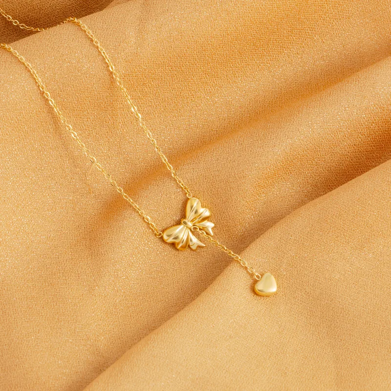 Bow heart necklace
