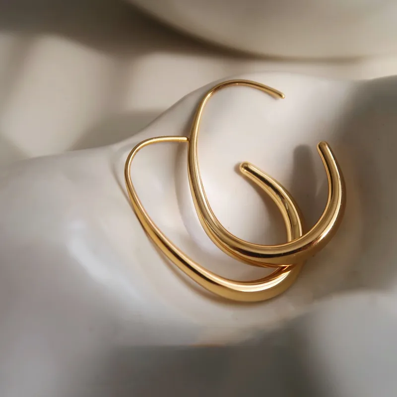 Sunlit arc hoop earrings